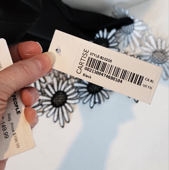 NWT Cartise Black Cut Out Sleeve Bottom Angled Top with Appliqued Flower Trim - Picture 11 of 12